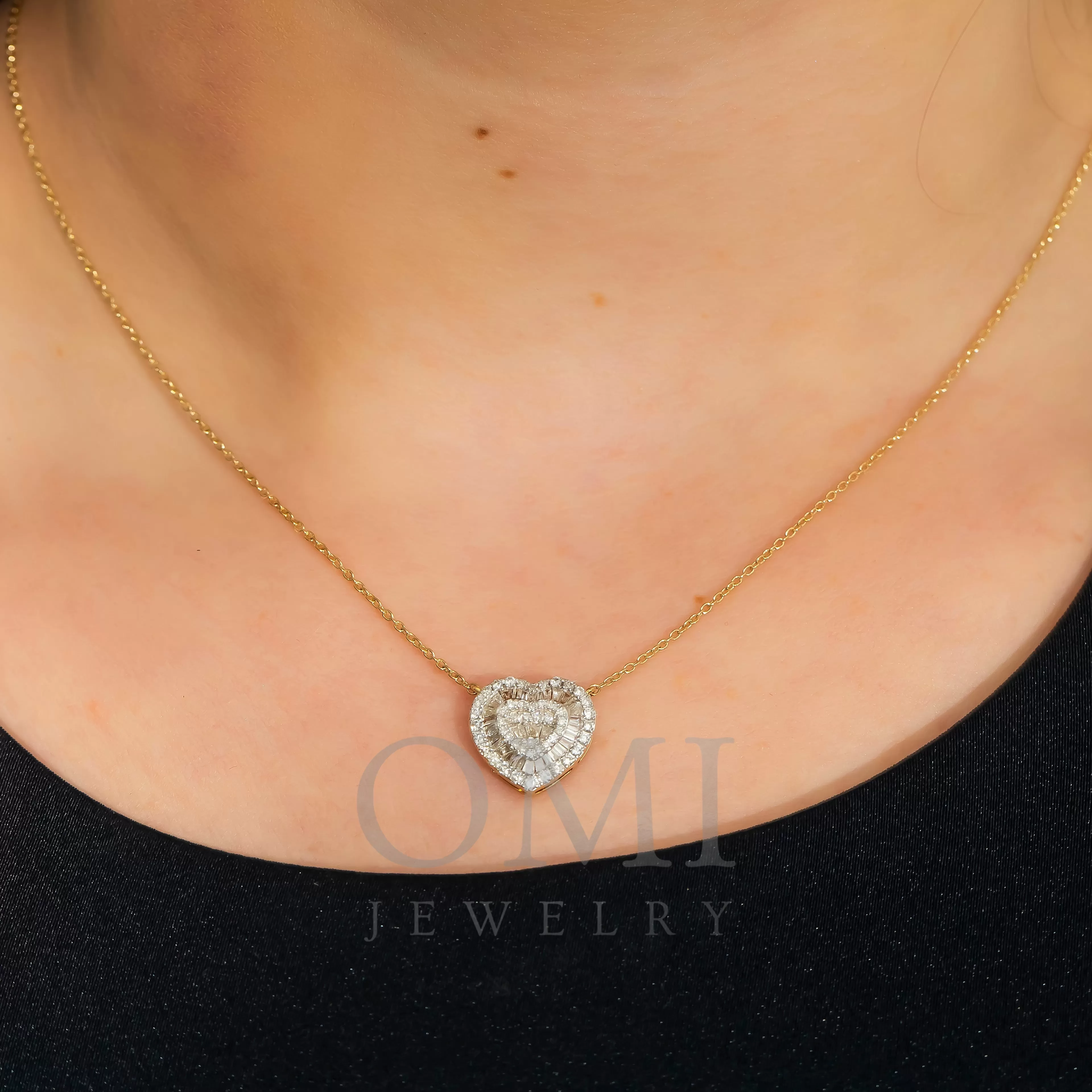 14K GOLD BAGUETTE AND ROUND DIAMOND HEART NECKLACE 0.63 CT