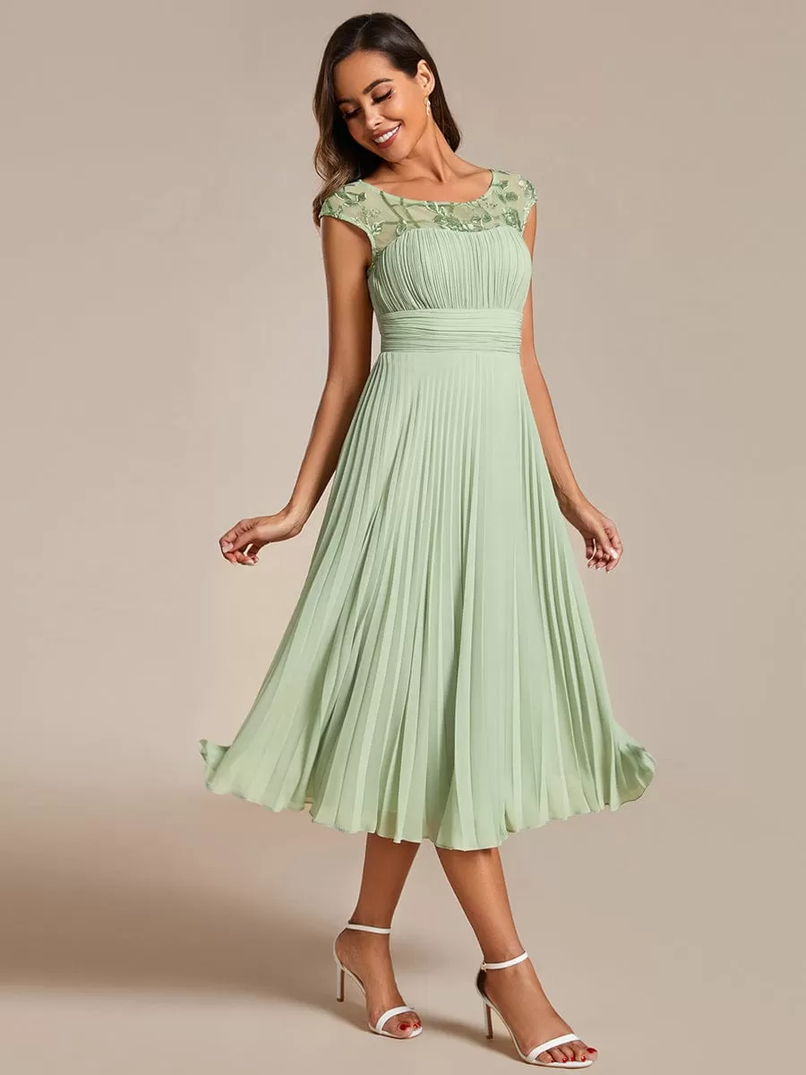 A-Line Pleated Chiffon Wedding Guest Dress with Round Neckline and Cap Sleeves