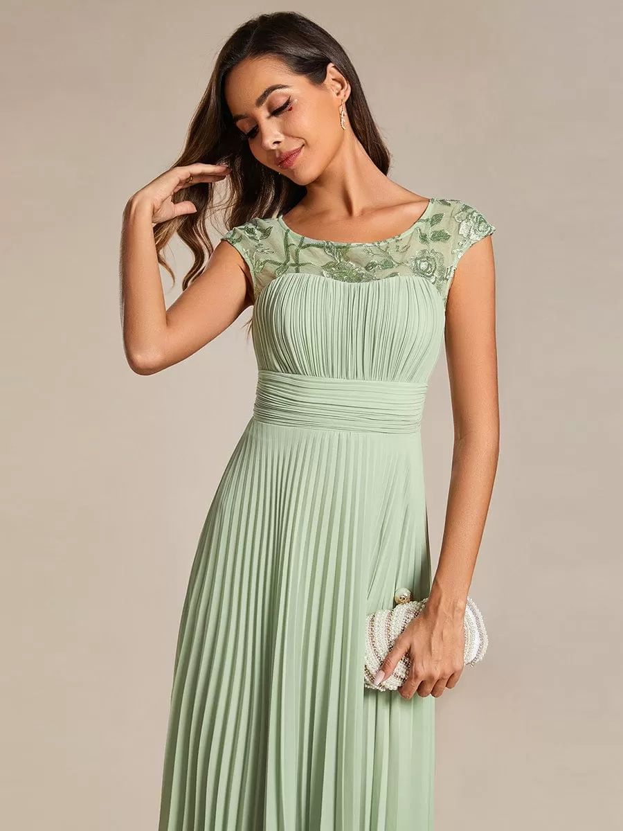 A-Line Pleated Chiffon Wedding Guest Dress with Round Neckline and Cap Sleeves