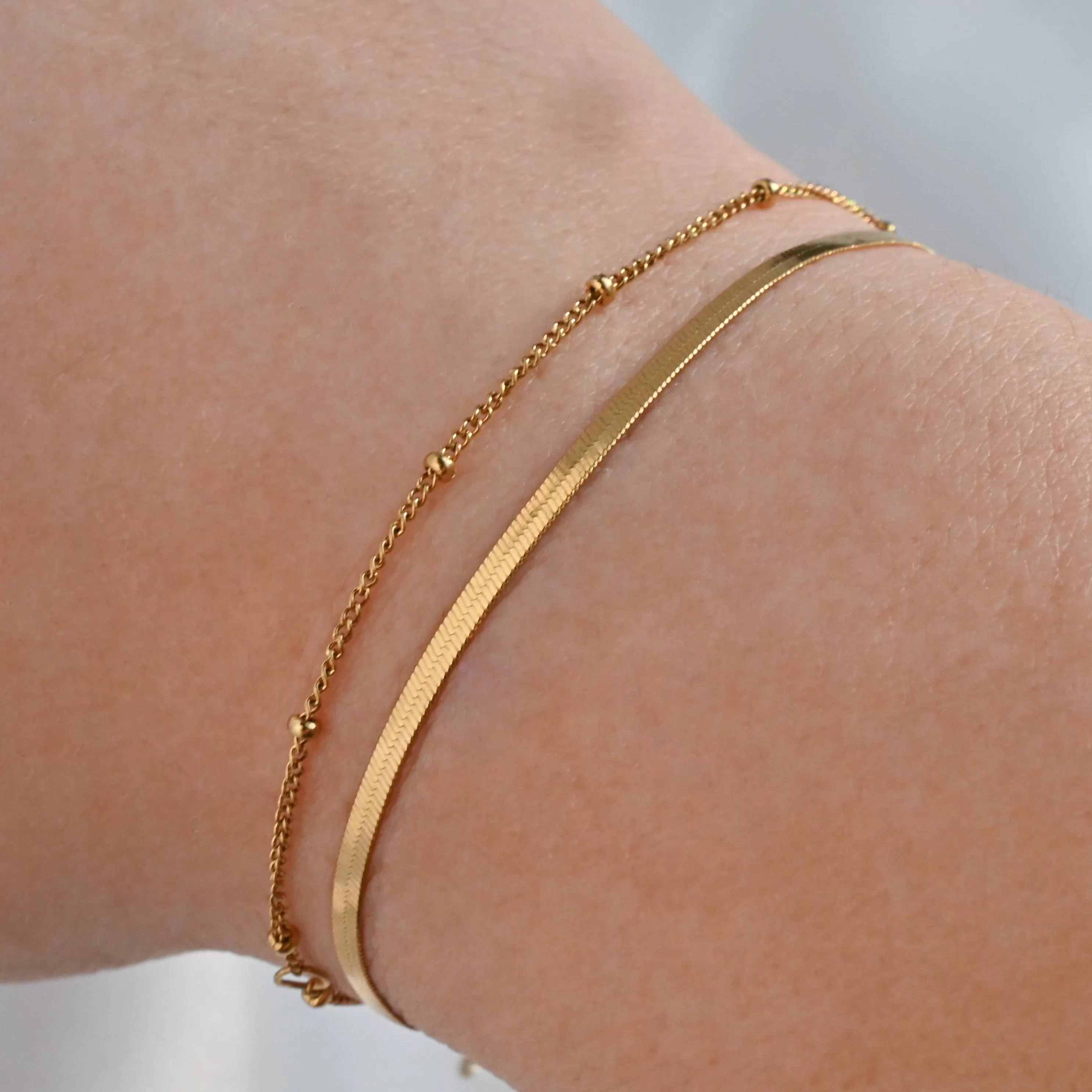 Dainty Herringbone Gold Bracelets