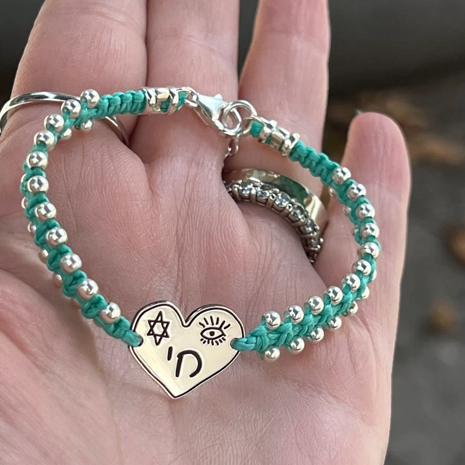 Macrame and silver bracelet with silver tags with blessings, names, words and messages.