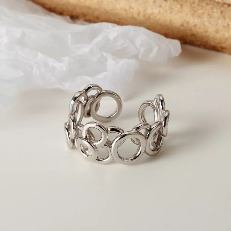 Skeletonized Mismatched Stacked Circles Band Ring