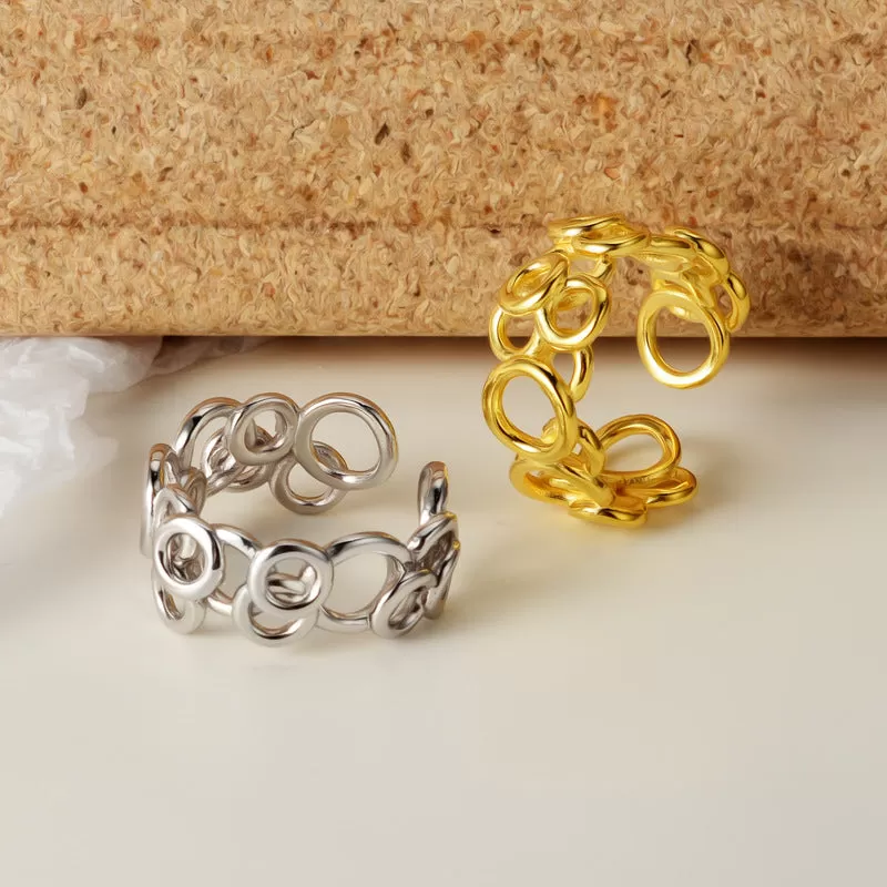 Skeletonized Mismatched Stacked Circles Band Ring